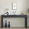 Antique black console table from the Artisan Collection by Anthony & Home showing a sleek wooden surface and elegant design.