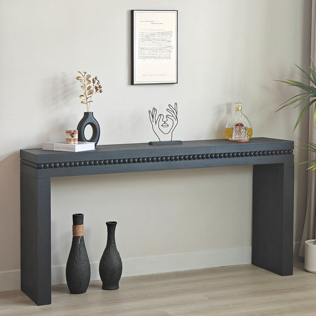 Antique black console table from the Artisan Collection with elegant wooden design and classic craftsmanship.
