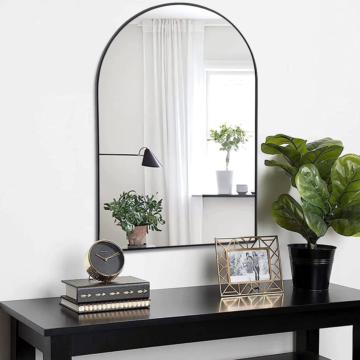 Arched black aluminum bathroom mirror measuring 20x30 inches with sleek, modern design by Anthony & Home.
