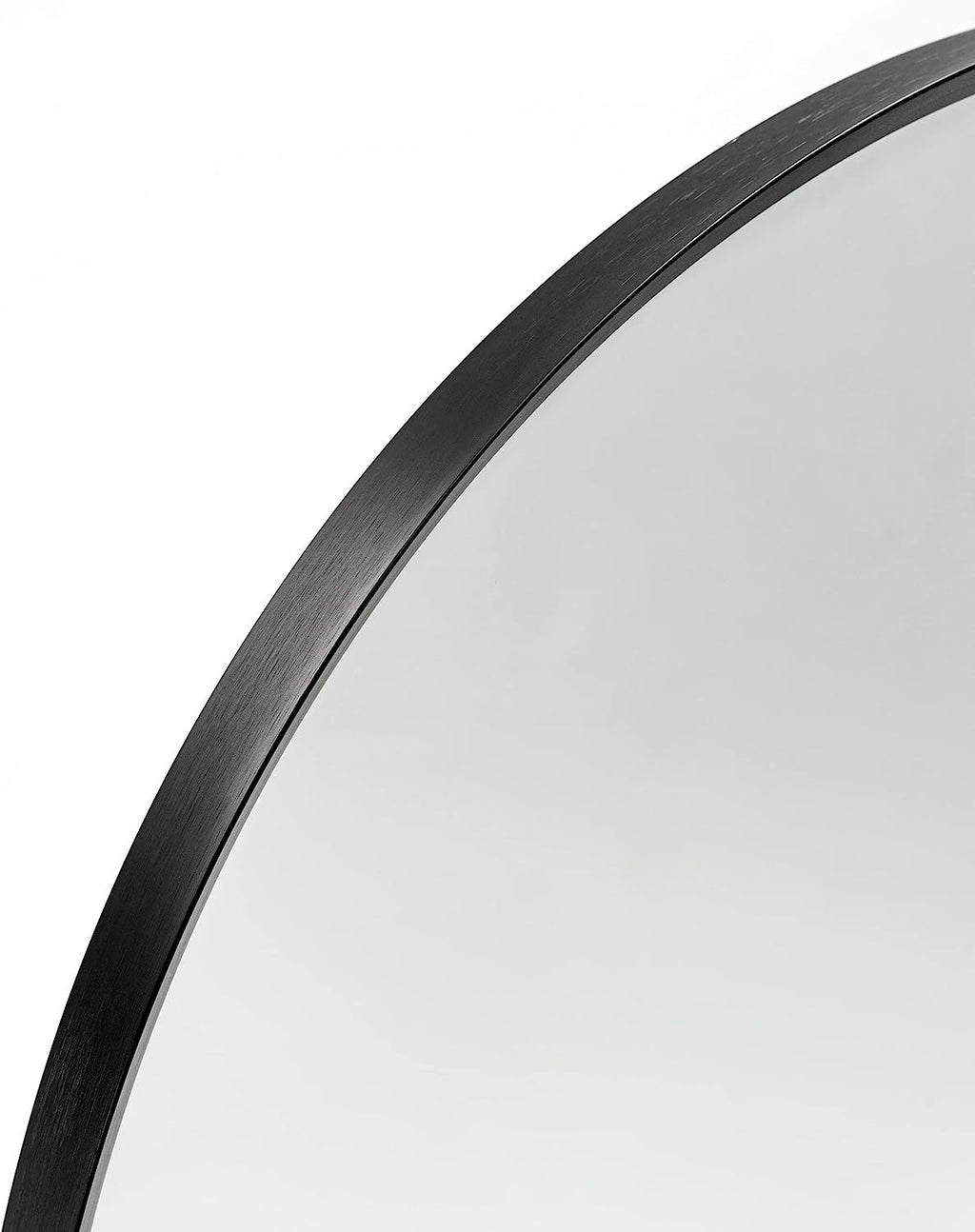 Arched black aluminum bathroom mirror, 20x30 inches, sleek and modern design by Anthony & Home, reflecting a stylish bathroom setting.