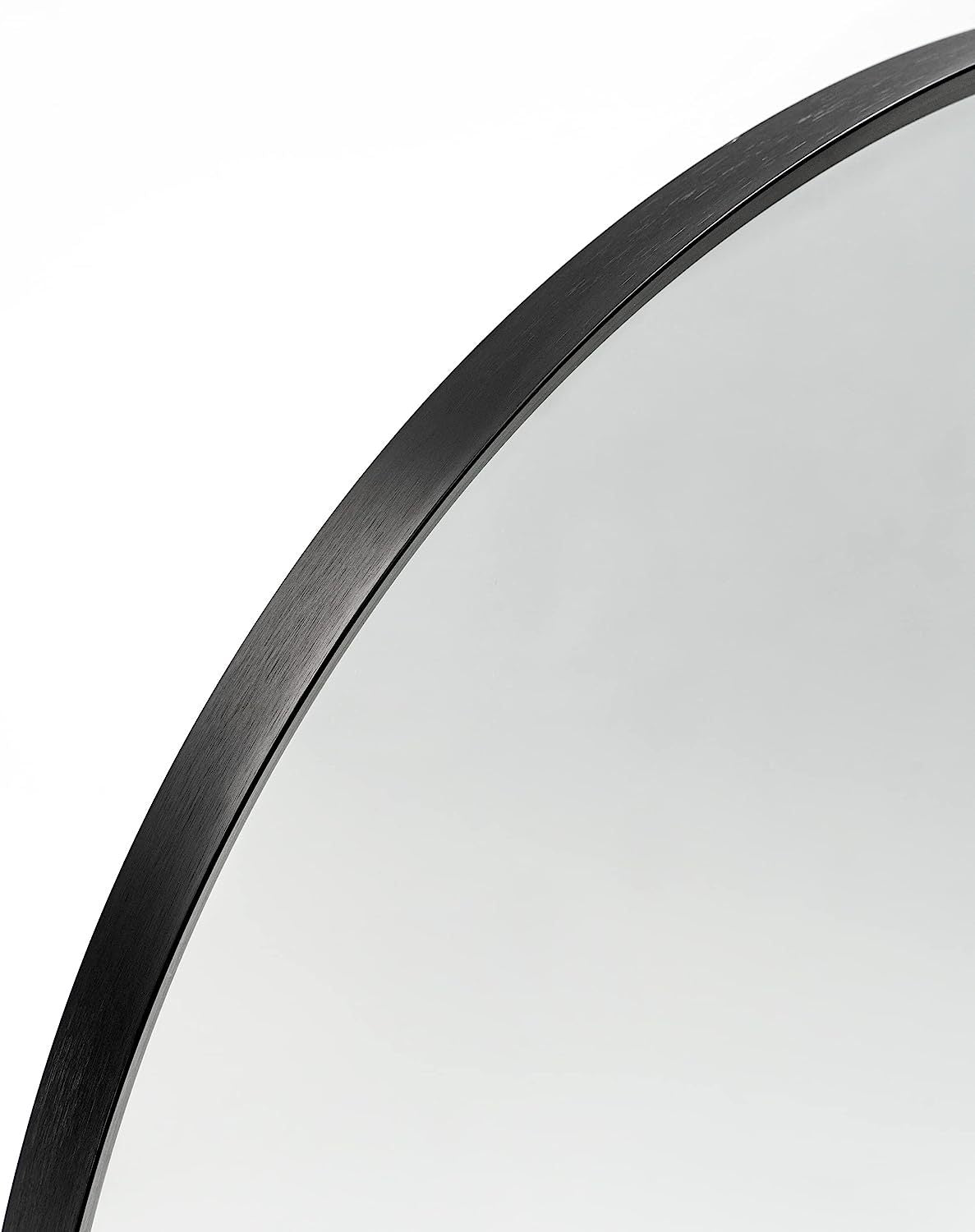 Arched black aluminum bathroom mirror, 20x30 inches, sleek and modern design by Anthony & Home, reflecting a stylish bathroom setting.