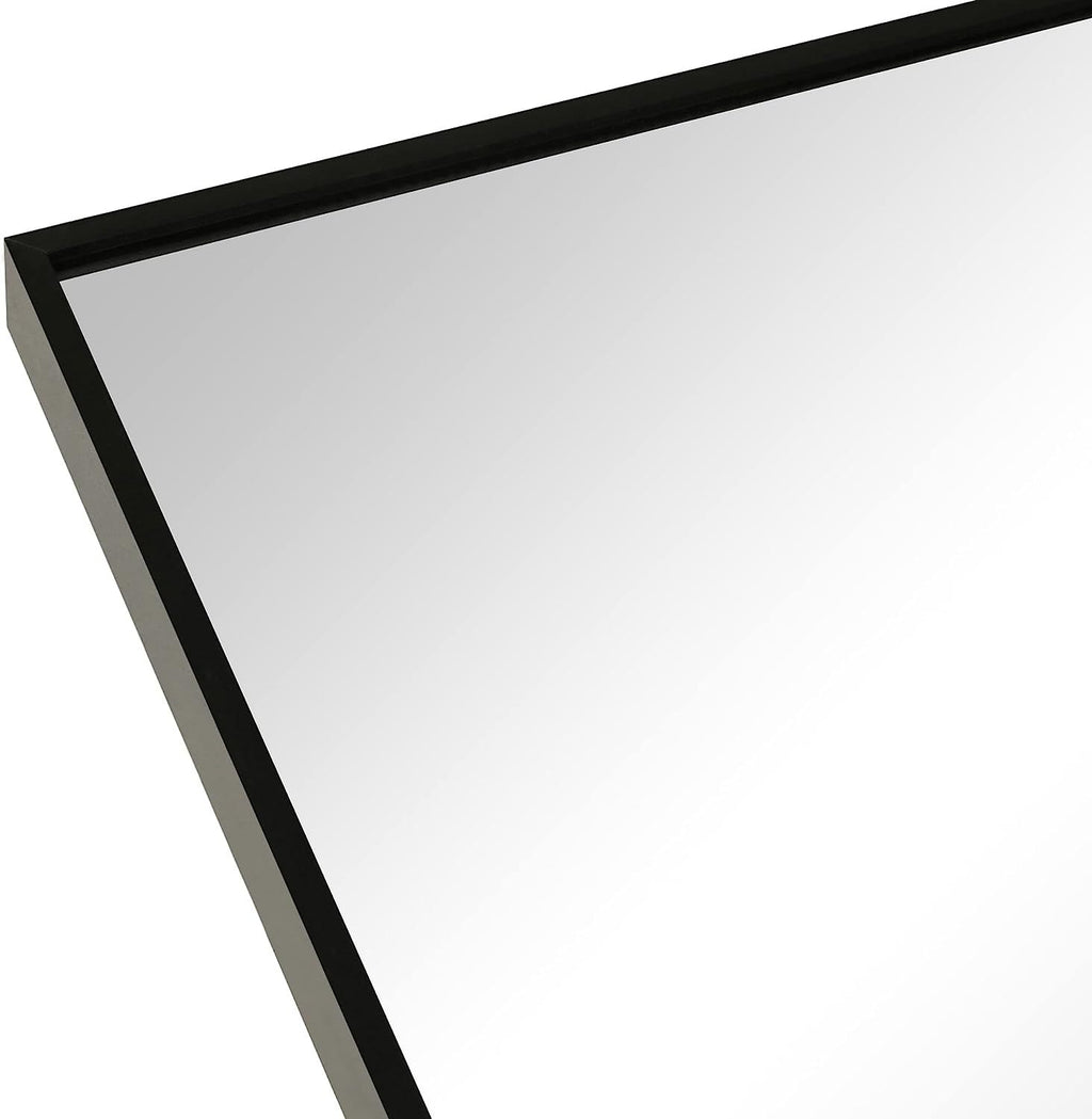Black aluminum arched bathroom mirror, 20x30 inches, sleek modern design from Anthony & Home, mounted on a bathroom wall