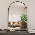 Arched black metal mirror with brushed aluminum frame from Anthony & Home Signature Collection, 24x36 inches.