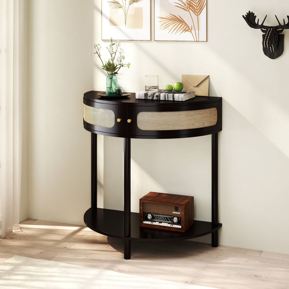 Black solid wood Atelier Demi-Lune end table with curved design by Anthony & Home, shown from a front angle.