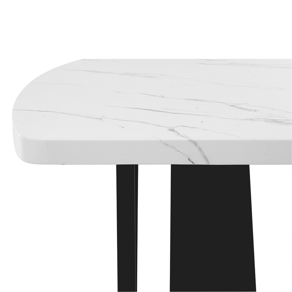 Anthony & Home Atelier faux marble dining table with black and white surface and geometric black legs, modern and stylish design.