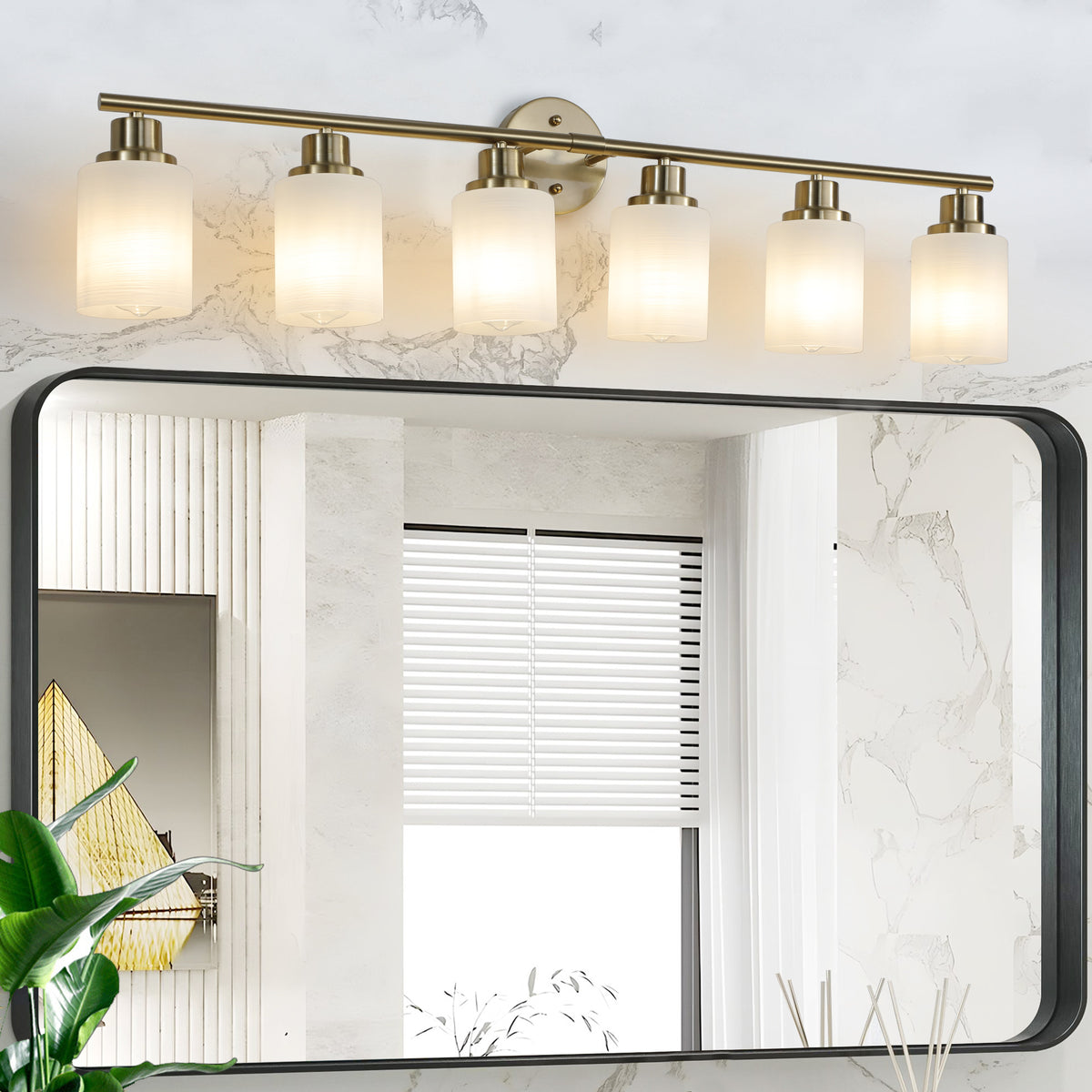 Anthony & Home Atelier Gold Finish Six-Light Vanity Wall Sconce with elegant gold-finished metal frame and six candle-style lights.