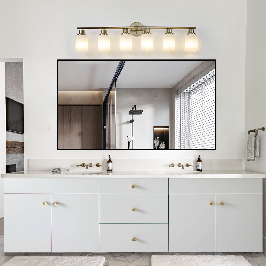 Anthony & Home Atelier Gold Finish Six-Light Vanity Wall Sconce with elegant gold accents and six candle-style lights.