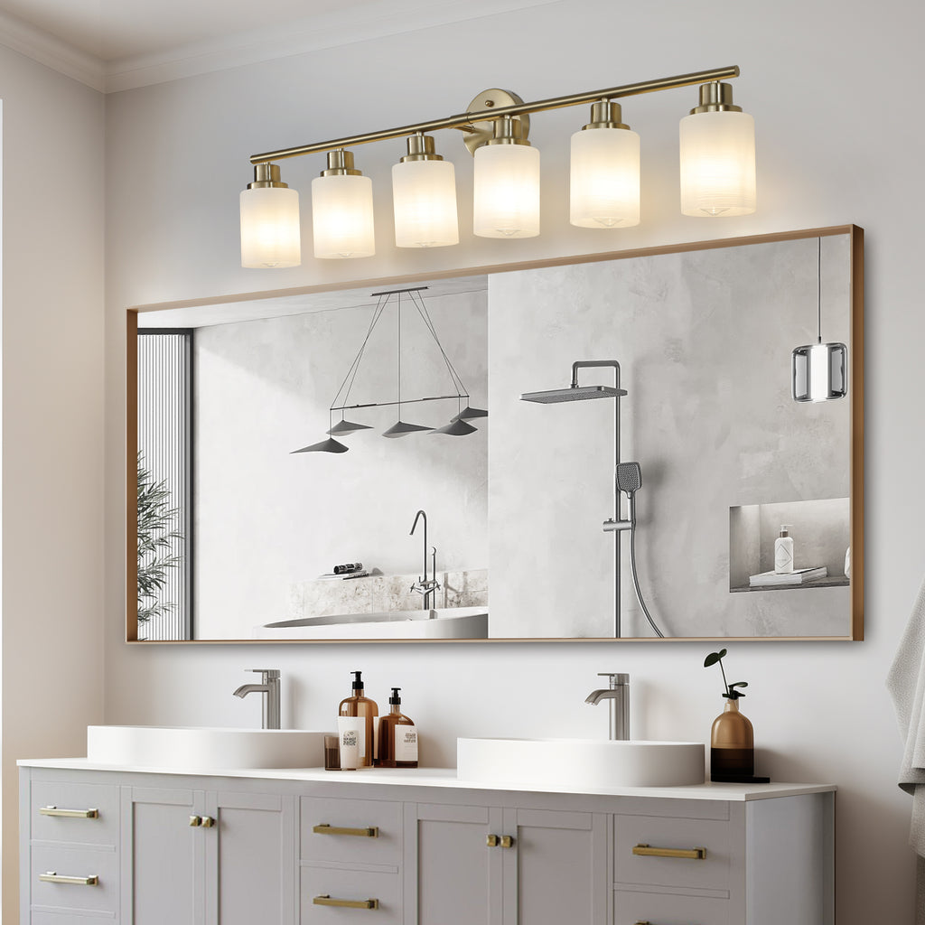 Anthony & Home Atelier Gold Finish Six-Light Vanity Wall Sconce with elegant gold finish and six candle-style light fixtures.