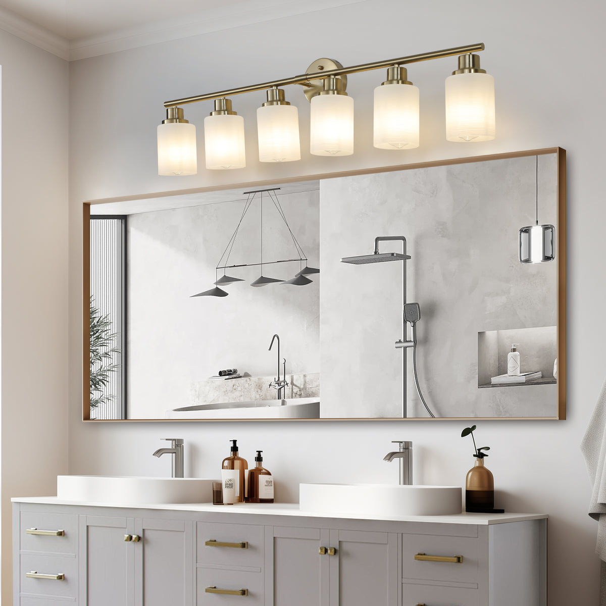 Anthony & Home Atelier Gold Finish Six-Light Vanity Wall Sconce with elegant gold finish and six candle-style light fixtures.