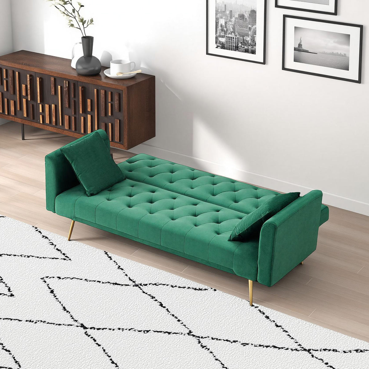 Green velvet convertible love seat by Anthony & Home with plush cushions and modern design, perfect for versatile living spaces.