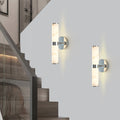 Pair of Atelier marble wall sconces by Anthony & Home, featuring elegant marble and metal design for modern wall lighting.