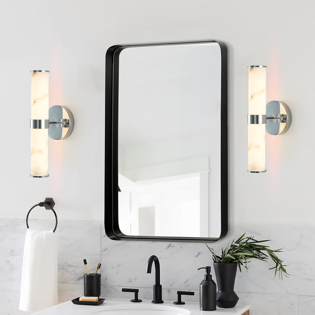 Set of two Atelier marble wall sconces by Anthony & Home with sleek modern design and integrated lighting features.
