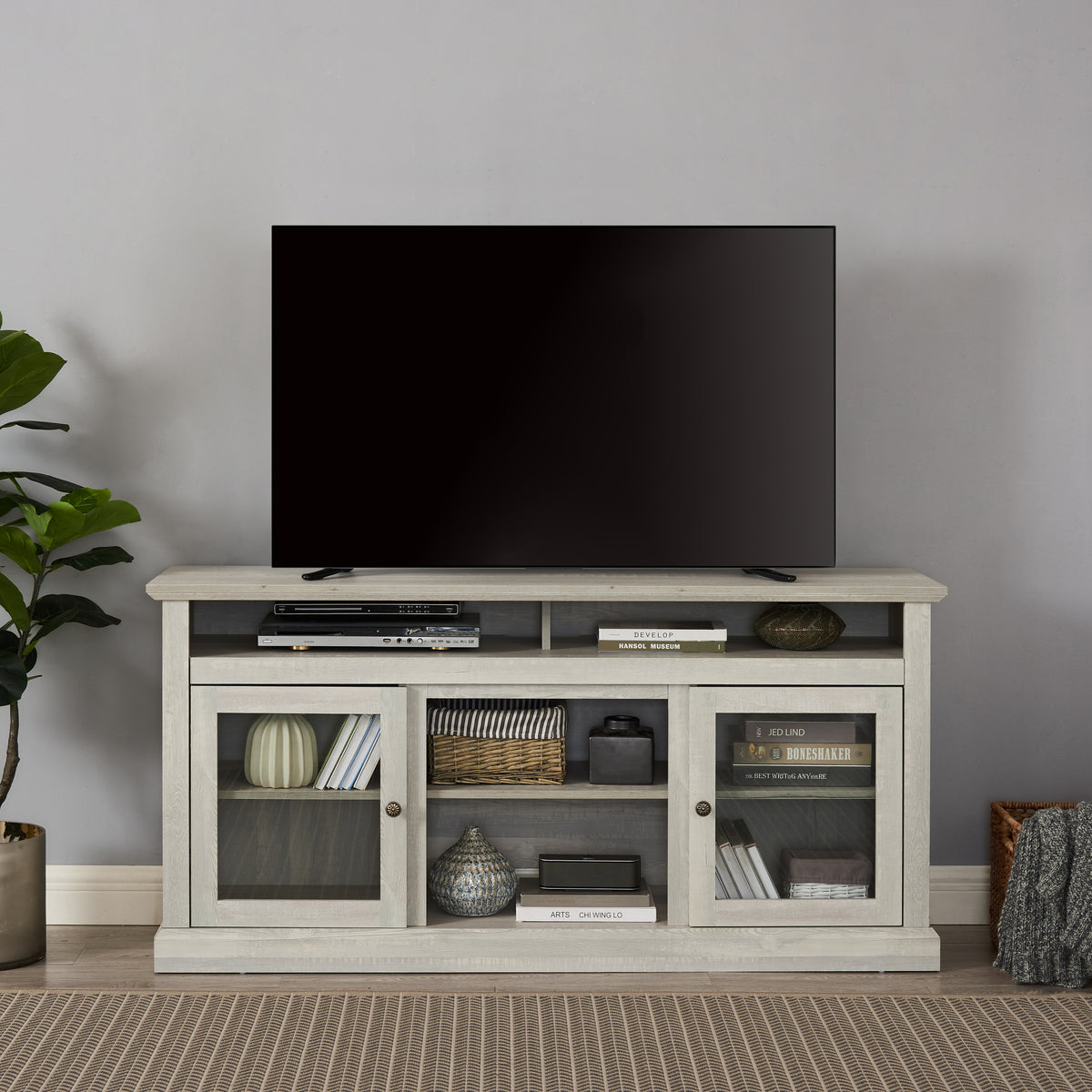 Anthony & Home Atelier Stone Gray TV console with dual storage, featuring sleek design and ample space for media devices.