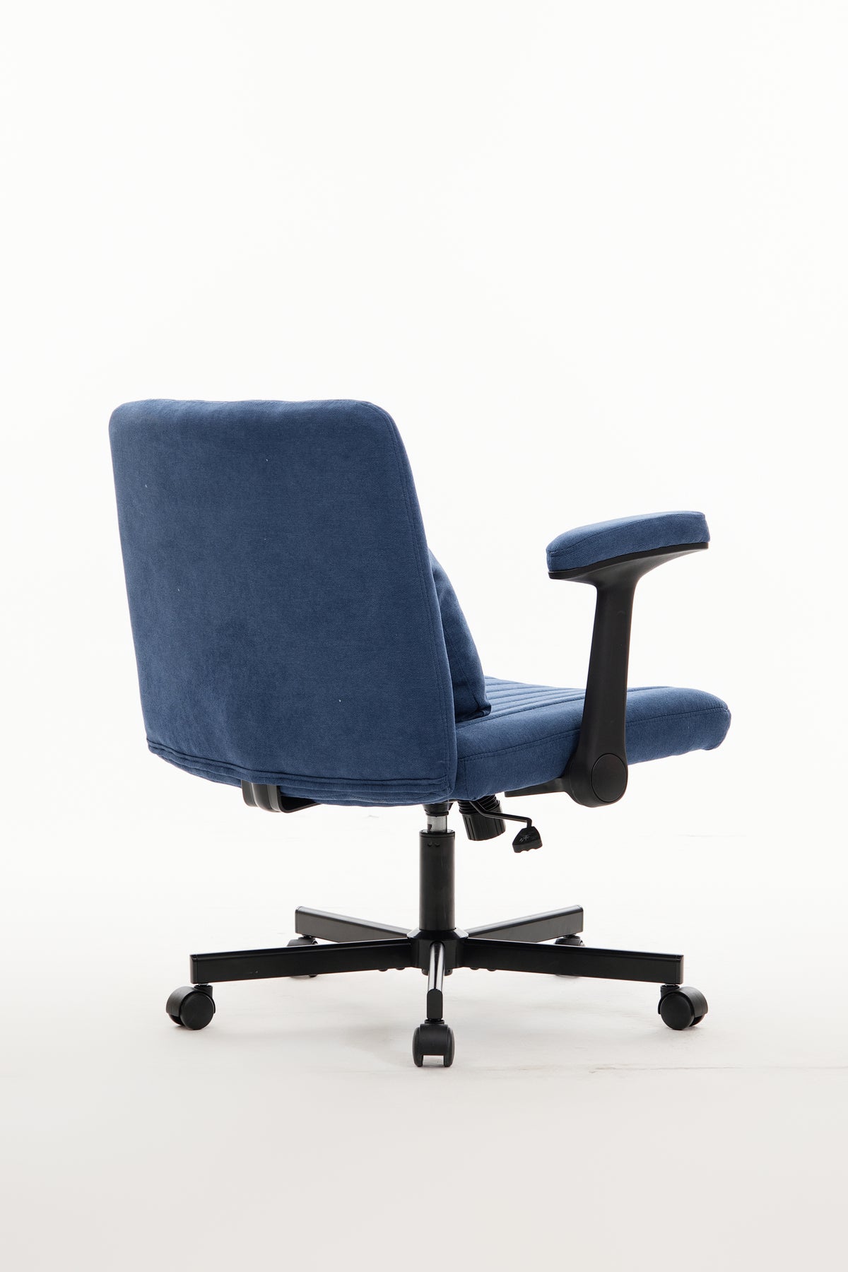 Anthony & Home Atelier velvet office chair with crisscross armrests, featuring plush upholstery and modern design.
