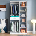 Anthony & Home Atelier white wood wardrobe system with sleek doors and ample storage space in a modern bedroom setting.