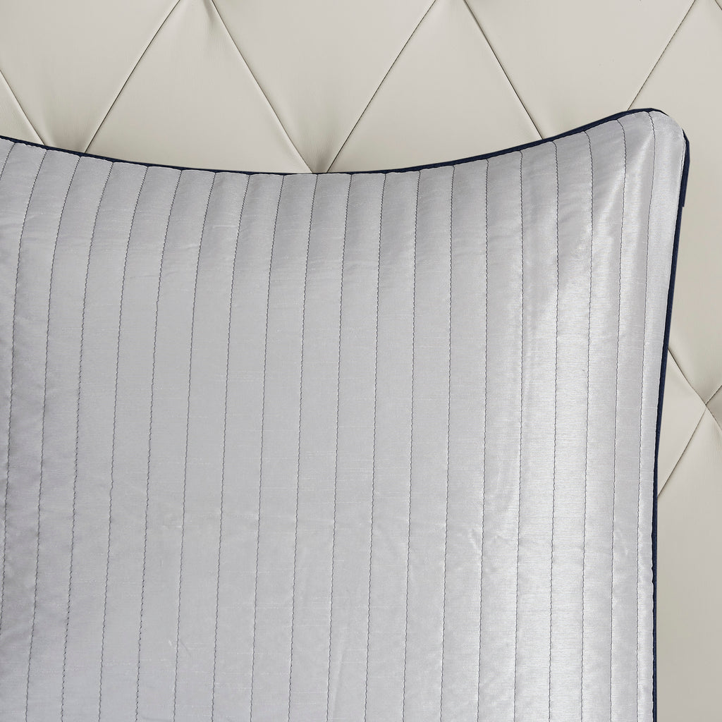 Anthony & Home Aubrey Jacquard Navy King Comforter Set showing intricate woven pattern on soft fabric bedding.