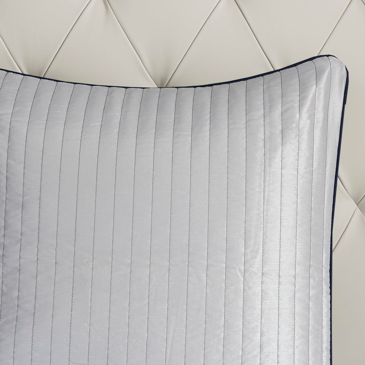 Anthony & Home Aubrey Jacquard Navy King Comforter Set showing intricate woven pattern on soft fabric bedding.