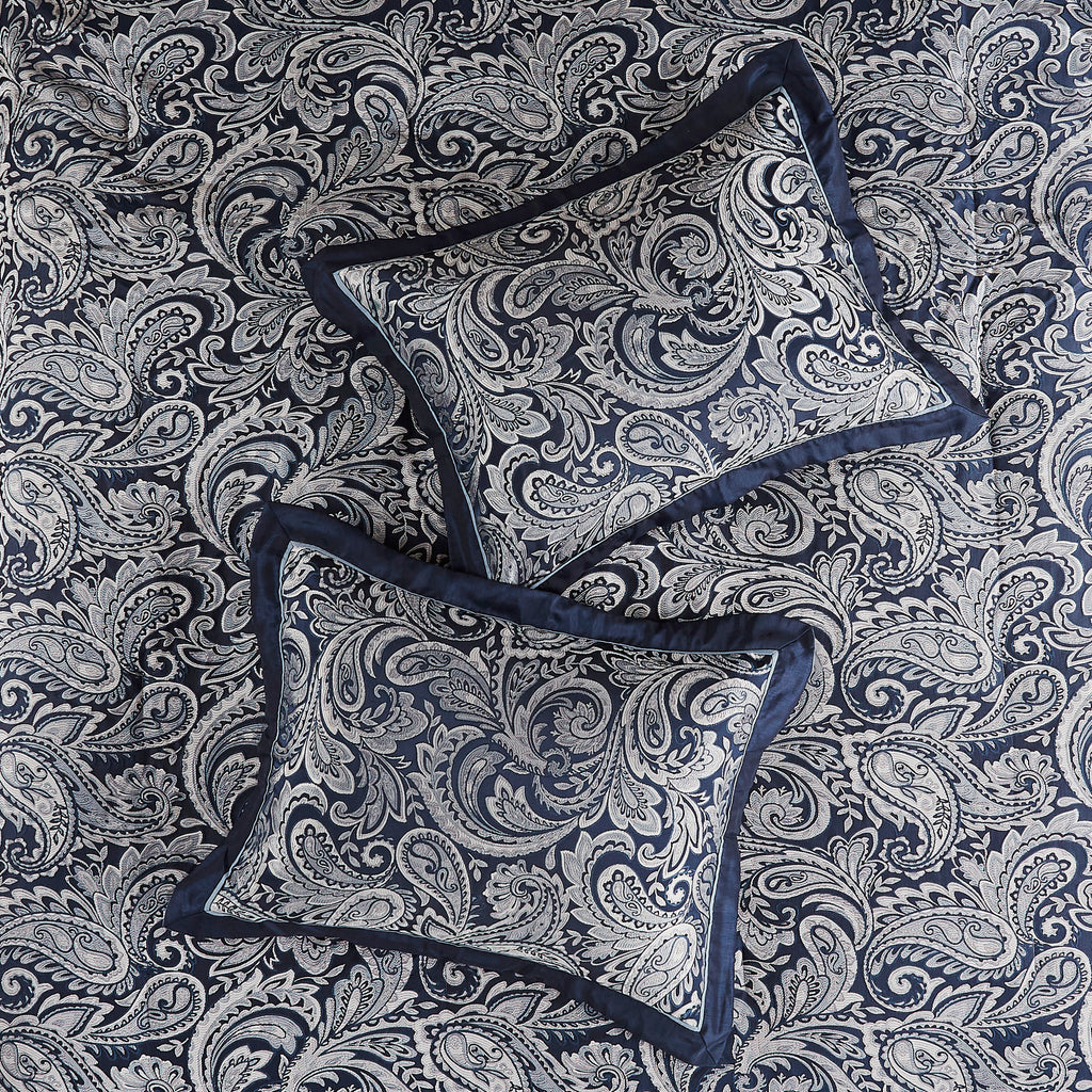 King Aubrey Jacquard navy comforter set by Anthony & Home featuring intricate woven pattern and plush fabric for luxurious bedding.