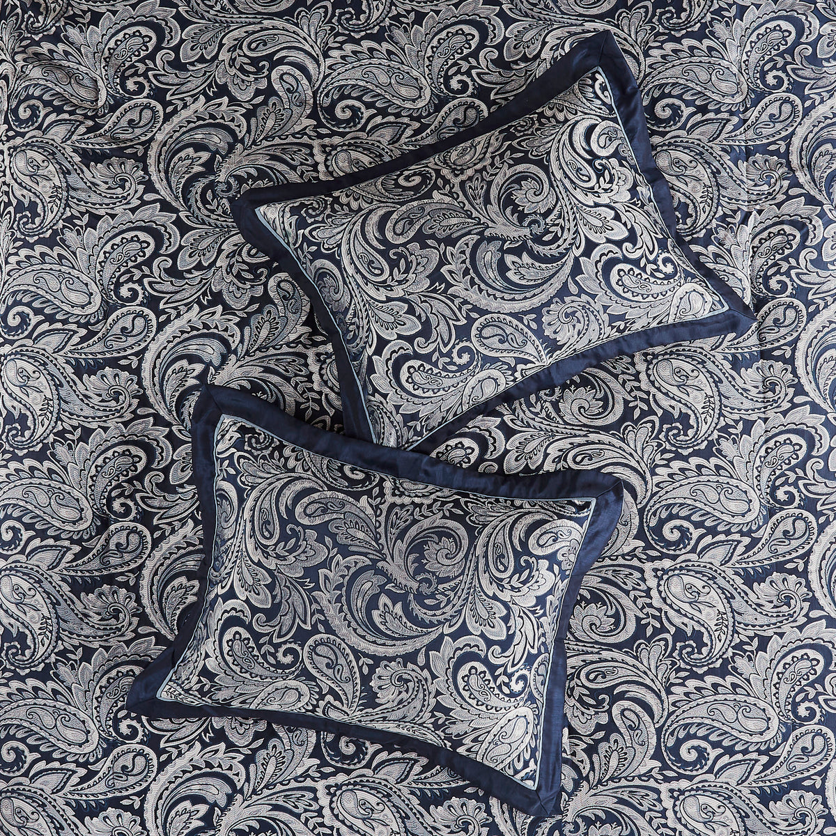 King Aubrey Jacquard navy comforter set by Anthony & Home featuring intricate woven pattern and plush fabric for luxurious bedding.
