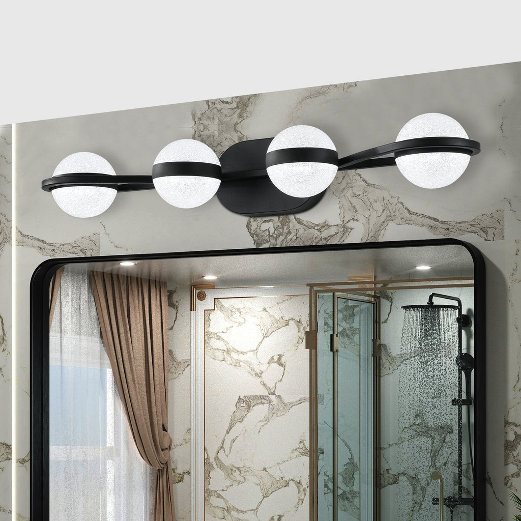 Black 4-light vanity fixture by Anthony & Home with crystal sand acrylic shades and modern design.