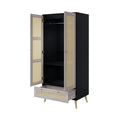 Boho armoire wardrobe with rattan door detail in natural black finish by Anthony & Home, showcasing a stylish storage solution.