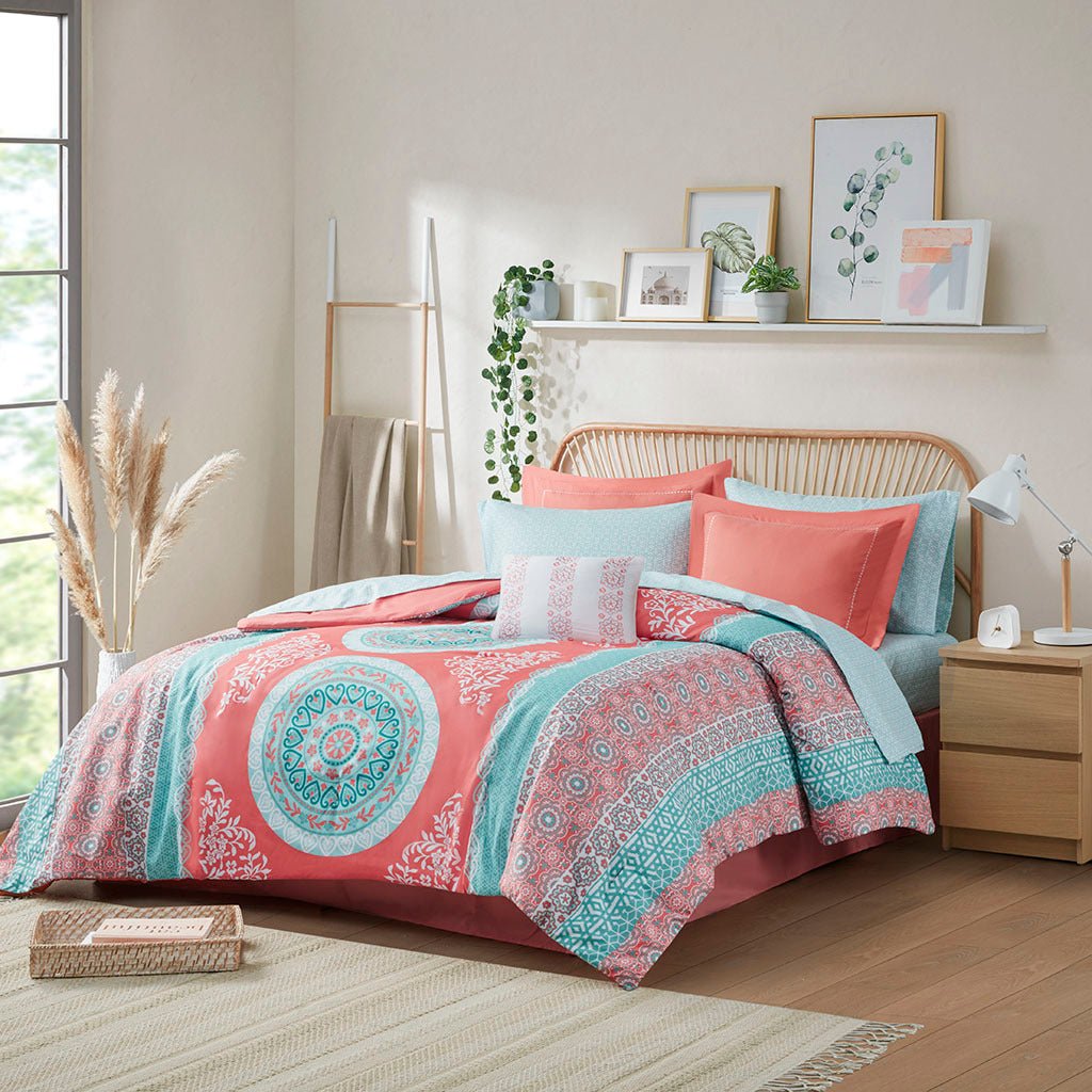 Anthony & Home Boho Luxe Coral Medallion comforter set with intricate patterns and vibrant colors, shown on a neatly made bed.