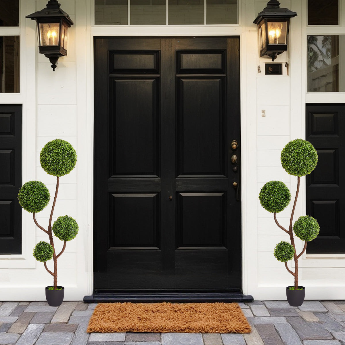 Boxwood topiary tree with triple ball shape, 59 inches tall, from Anthony & Home, featuring lush green foliage in a decorative garden setting.