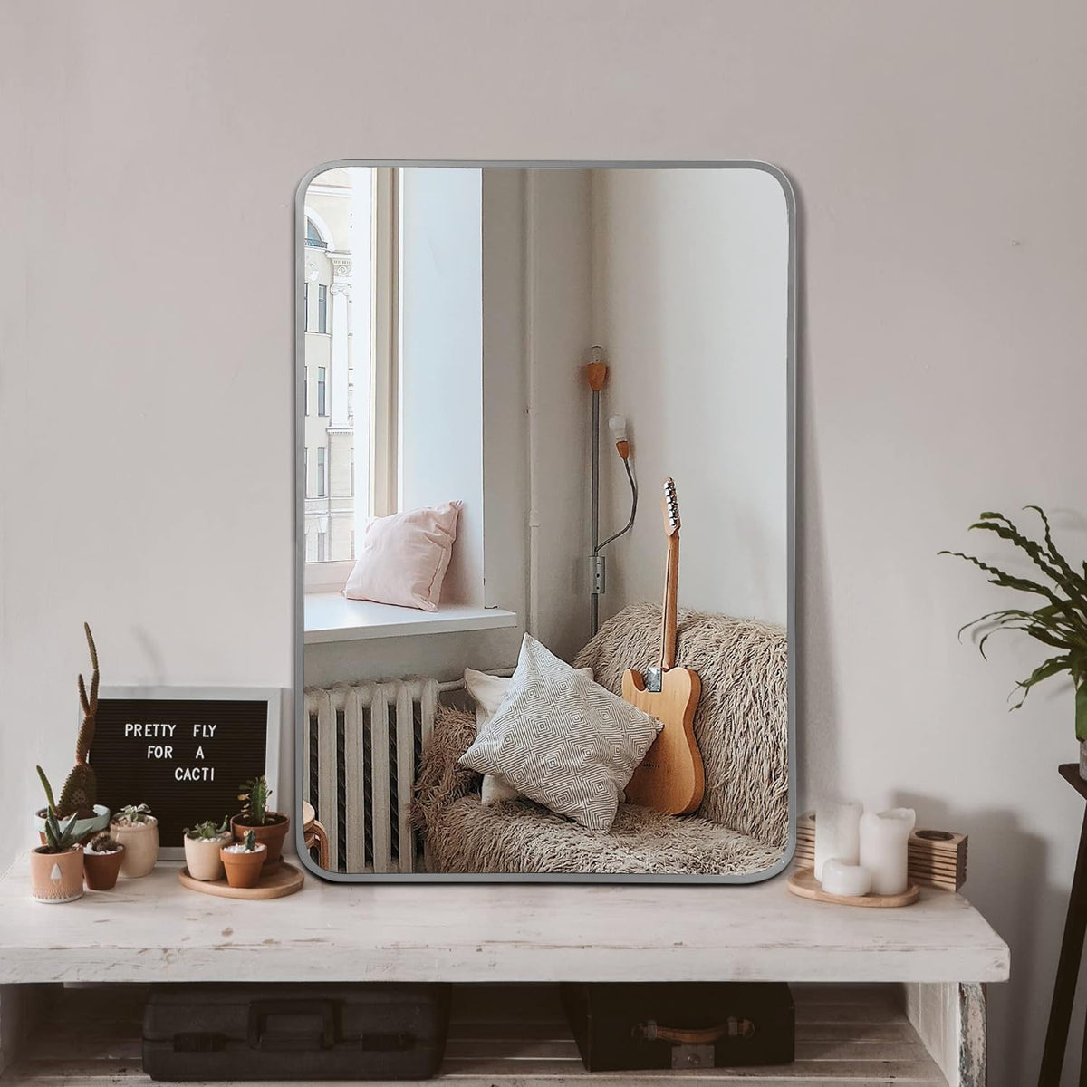 Brushed silver aluminum framed bathroom mirror, 24x32 inches, modern design with reflective glass surface.
