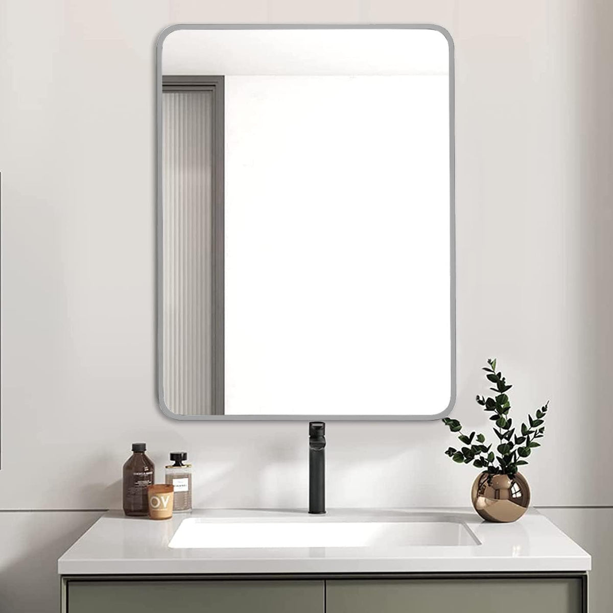 Brushed silver aluminum framed bathroom mirror, 24x32 inches, with sleek modern design for contemporary bathroom decor