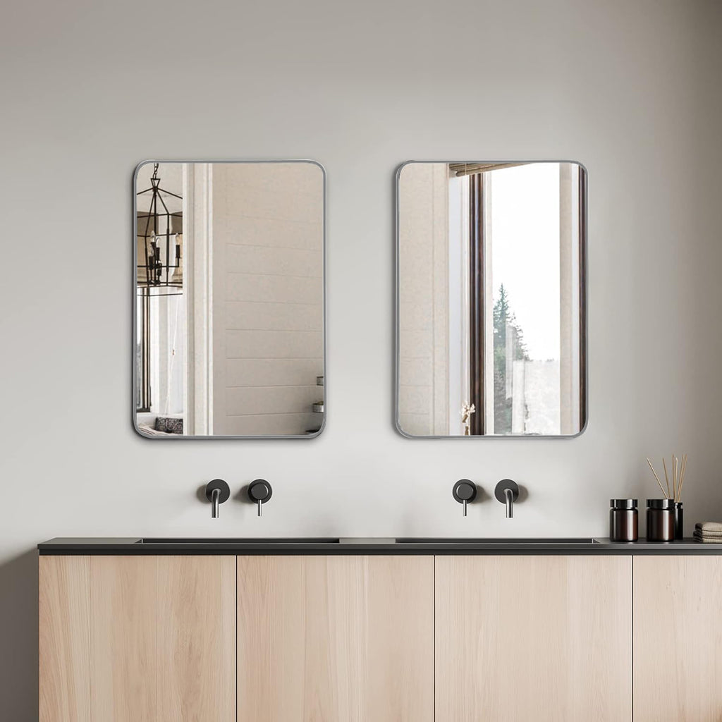 Brushed silver aluminum framed bathroom mirror measuring 24x32 inches, sleek and modern design, bathroom decor by Anthony & Home