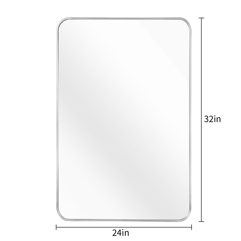 Brushed silver aluminum framed bathroom mirror measuring 24x32 inches, with sleek modern design and reflective glass surface.