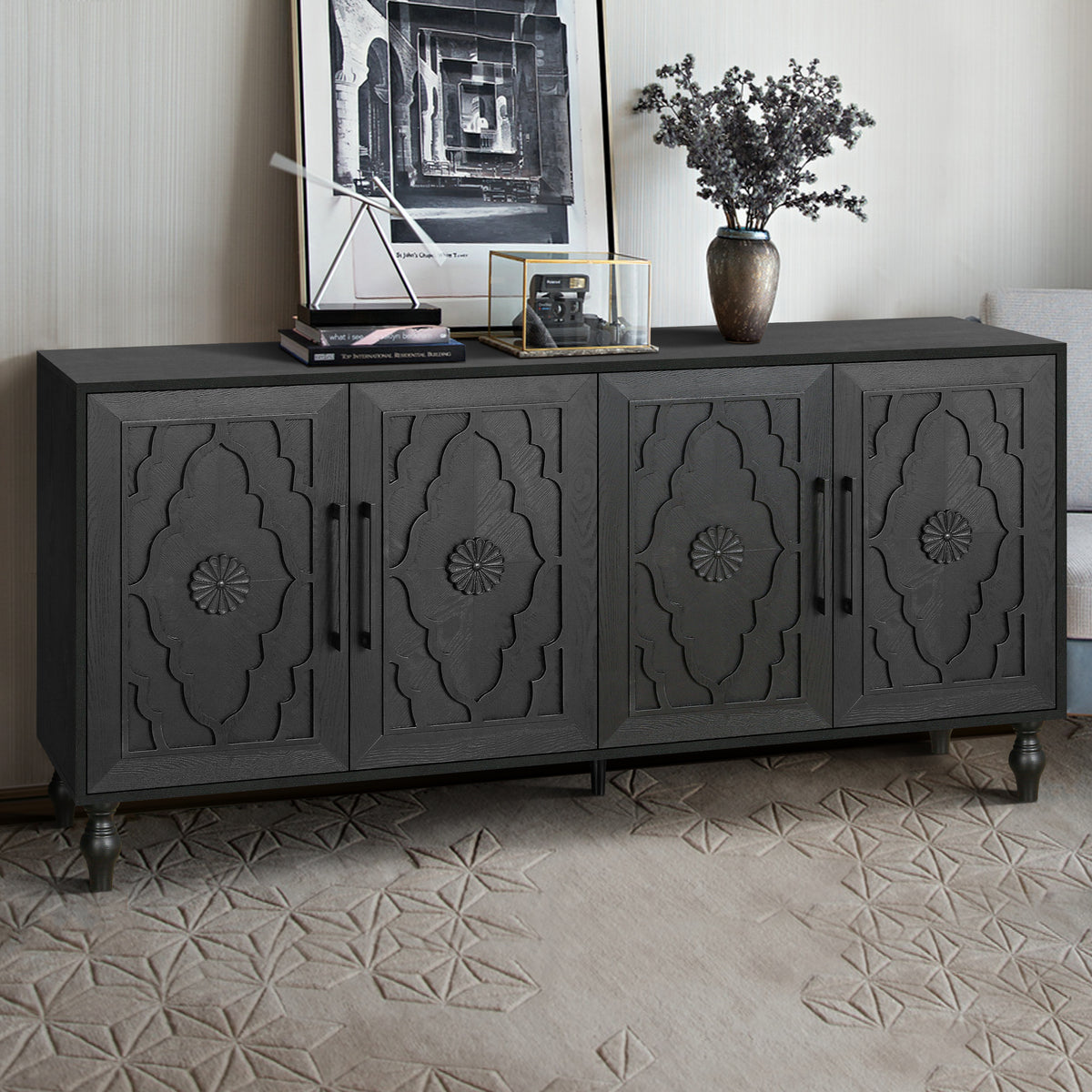 Black carved flower Anthony & Home studio storage cabinet with intricate floral detailing and multiple storage compartments.