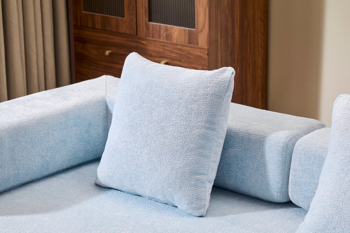 Light blue Anthony & Home Chenille Collection convertible floor sofa bed with memory foam cushions, showcasing its plush fabric and versatile design.