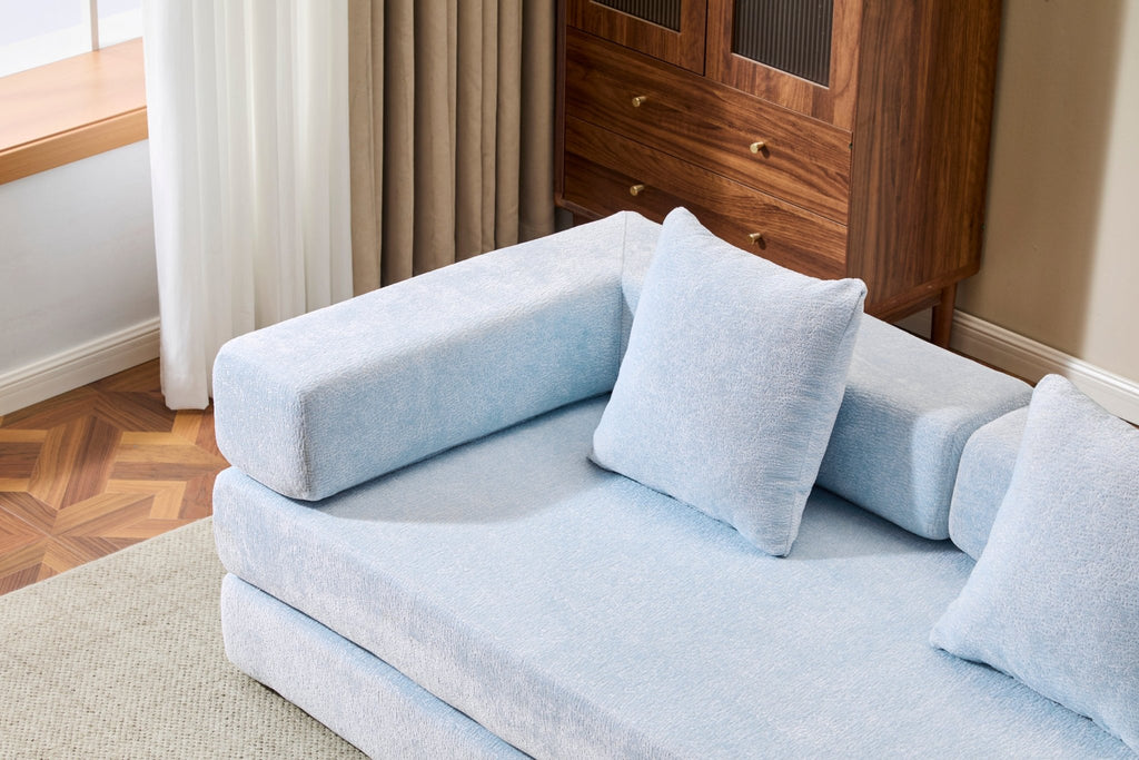 Light blue Anthony & Home Chenille convertible floor sofa bed with memory foam cushions, showcasing its soft fabric and versatile design.