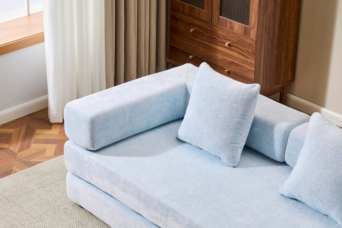 Light blue Anthony & Home Chenille convertible floor sofa bed with memory foam cushions, showcasing its soft fabric and versatile design.