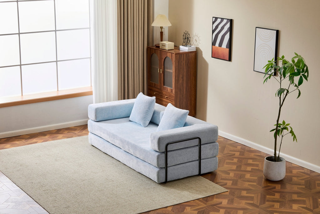 Light blue Anthony & Home Chenille Collection convertible floor sofa bed with memory foam cushions, versatile and comfortable for seating or sleeping.