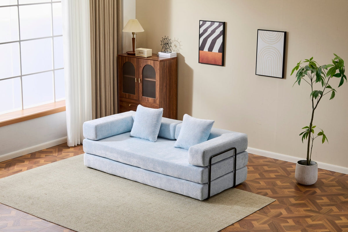 Light blue Anthony & Home Chenille Collection convertible floor sofa bed with memory foam cushions, showcasing its plush, versatile design.