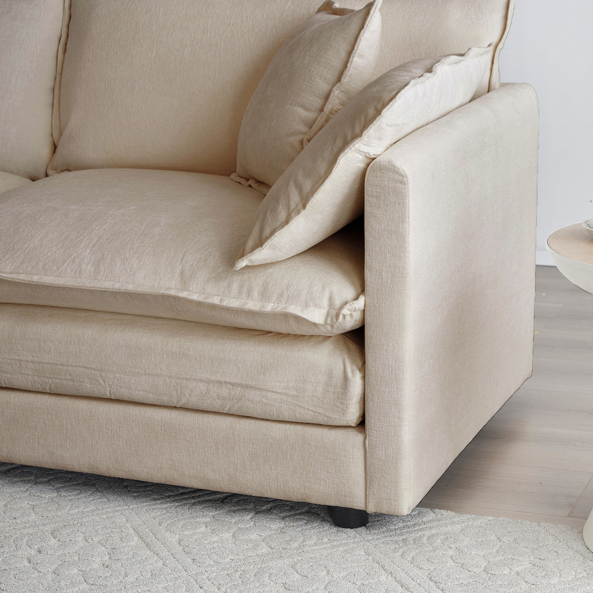 Beige Chenille Collection L-shaped sectional sofa by Anthony & Home with plush cushions and modern design.