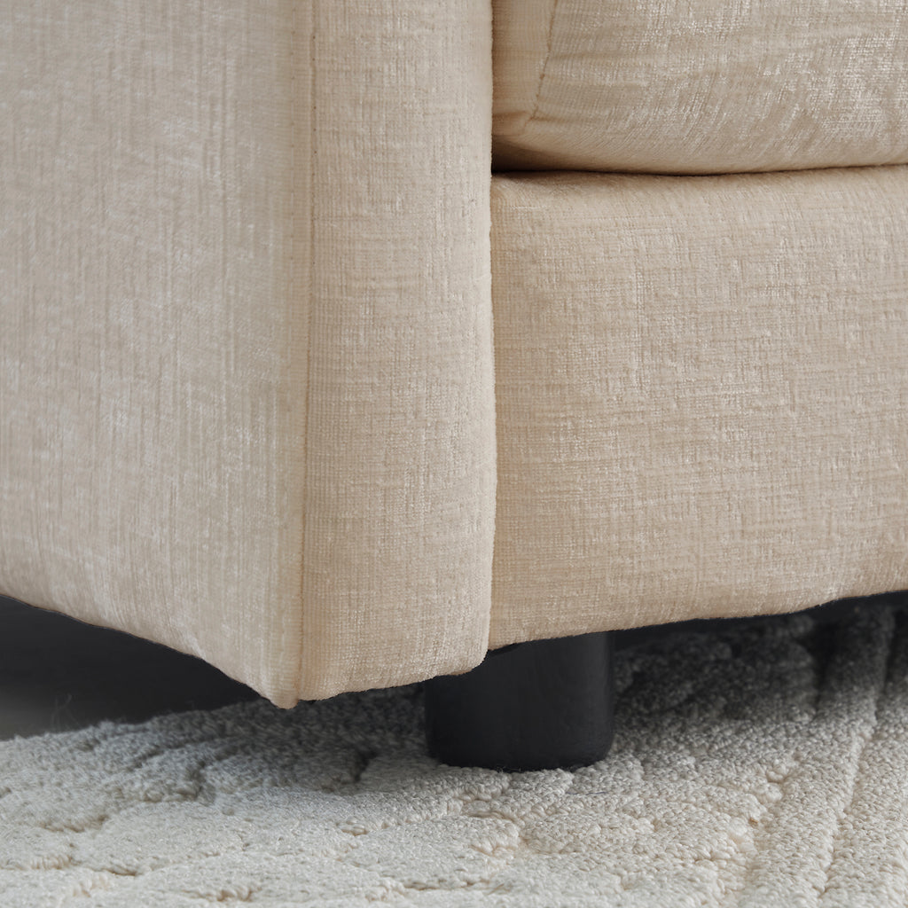 Beige Anthony & Home Chenille Collection L-shaped sectional sofa with plush cushions and soft fabric upholstery.