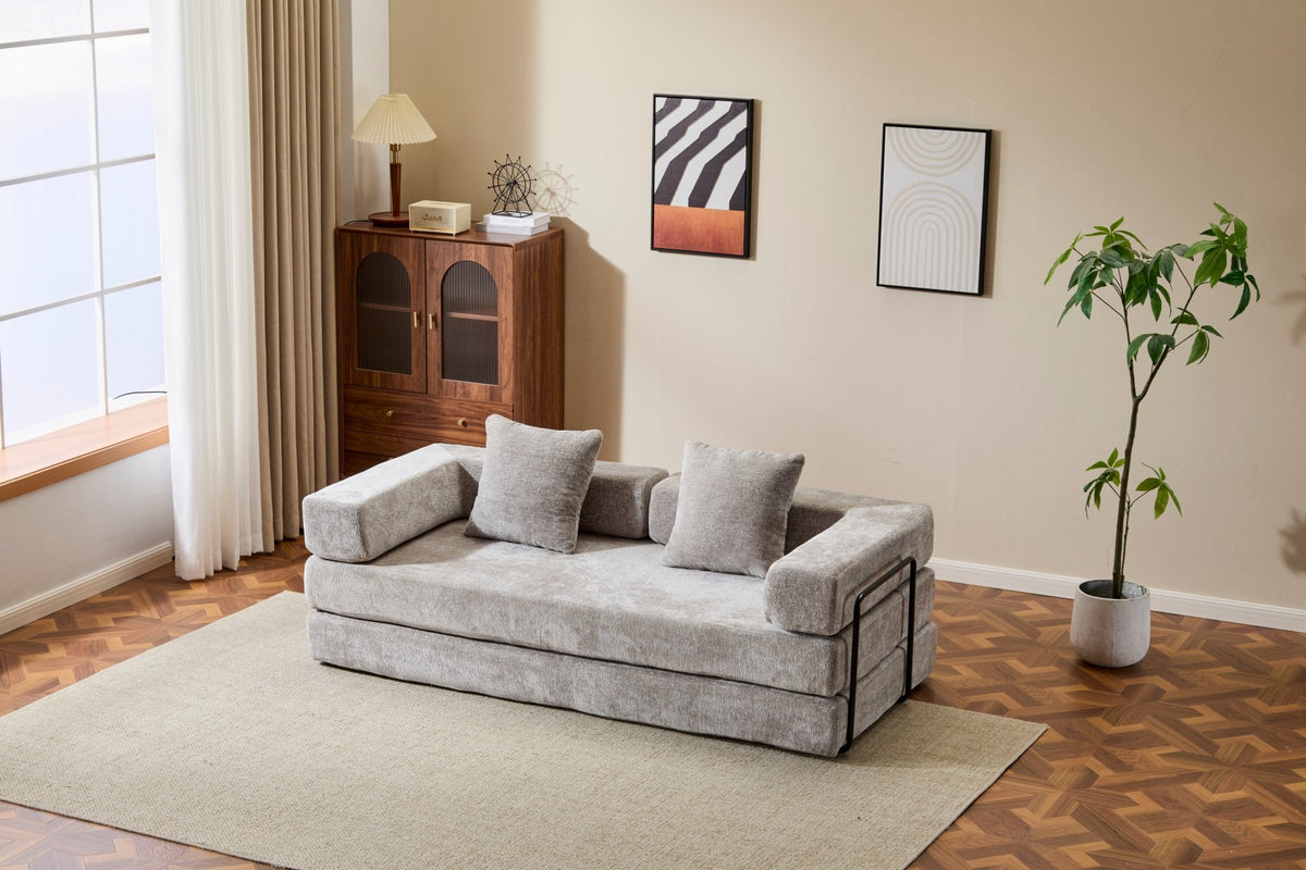 Light grey Anthony & Home Chenille floor sofa bed with convertible design and pillow back, Signature Edition style.