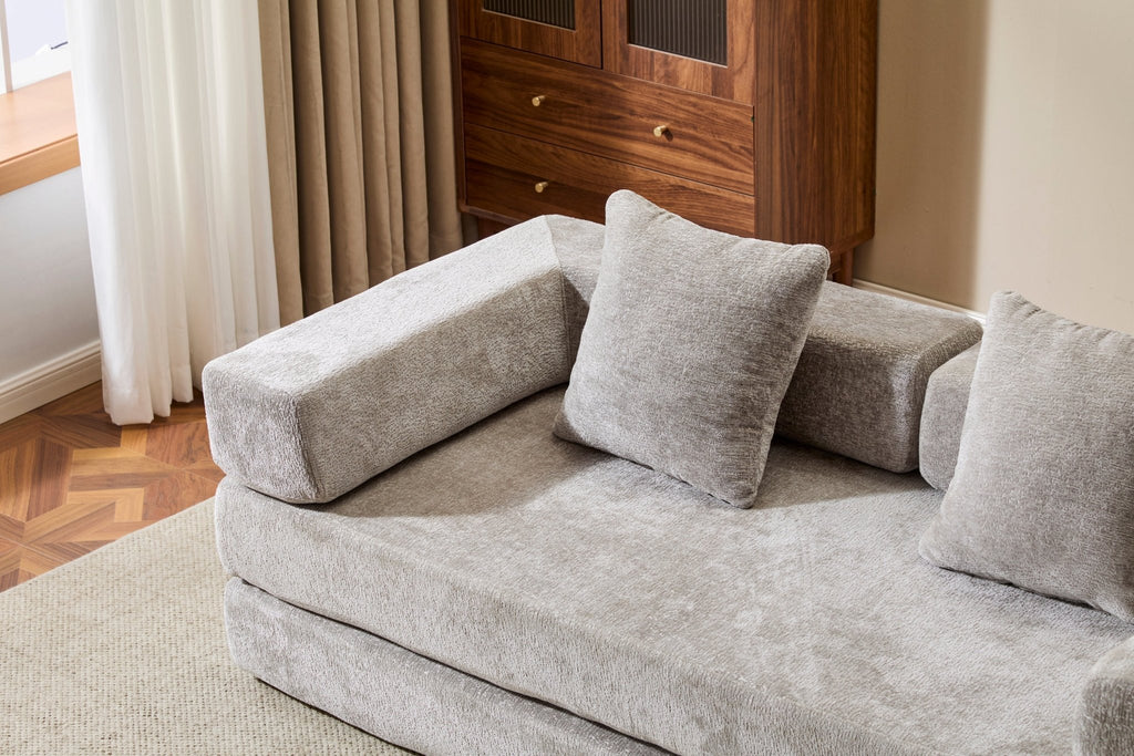 Light grey Anthony & Home Chenille sofa bed with pillow back, convertible design, in a modern living room setting.