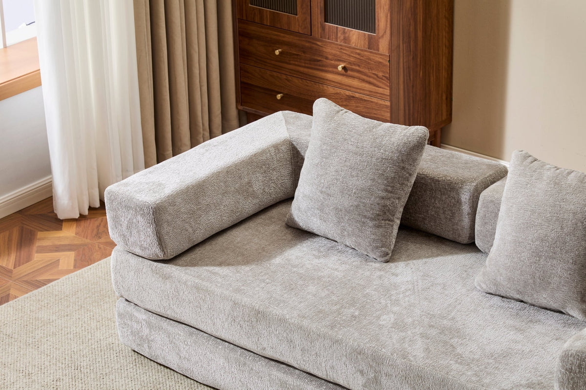 Light grey Anthony & Home Chenille sofa bed with pillow back, convertible design, in a modern living room setting.
