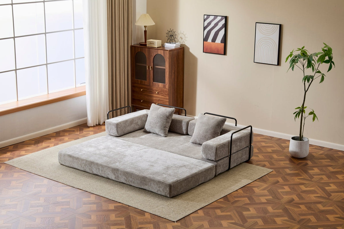 Light grey convertible chenille sofa bed with pillow back by Anthony & Home, showcasing a modern, comfortable living room setup.