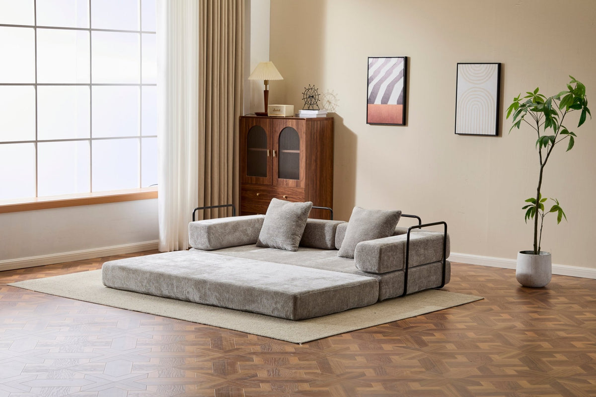 Light grey Anthony & Home chenille sofa bed with pillow back in convertible design, showcased in a cozy living room setting.