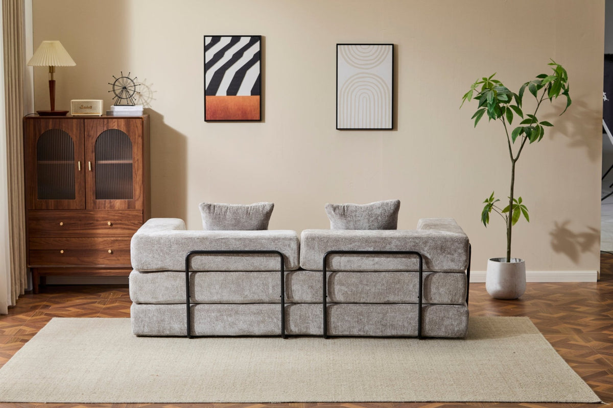 Light grey Anthony & Home chenille sofa bed with pillow back, convertible design, signature edition, suitable for living room seating and sleeping.