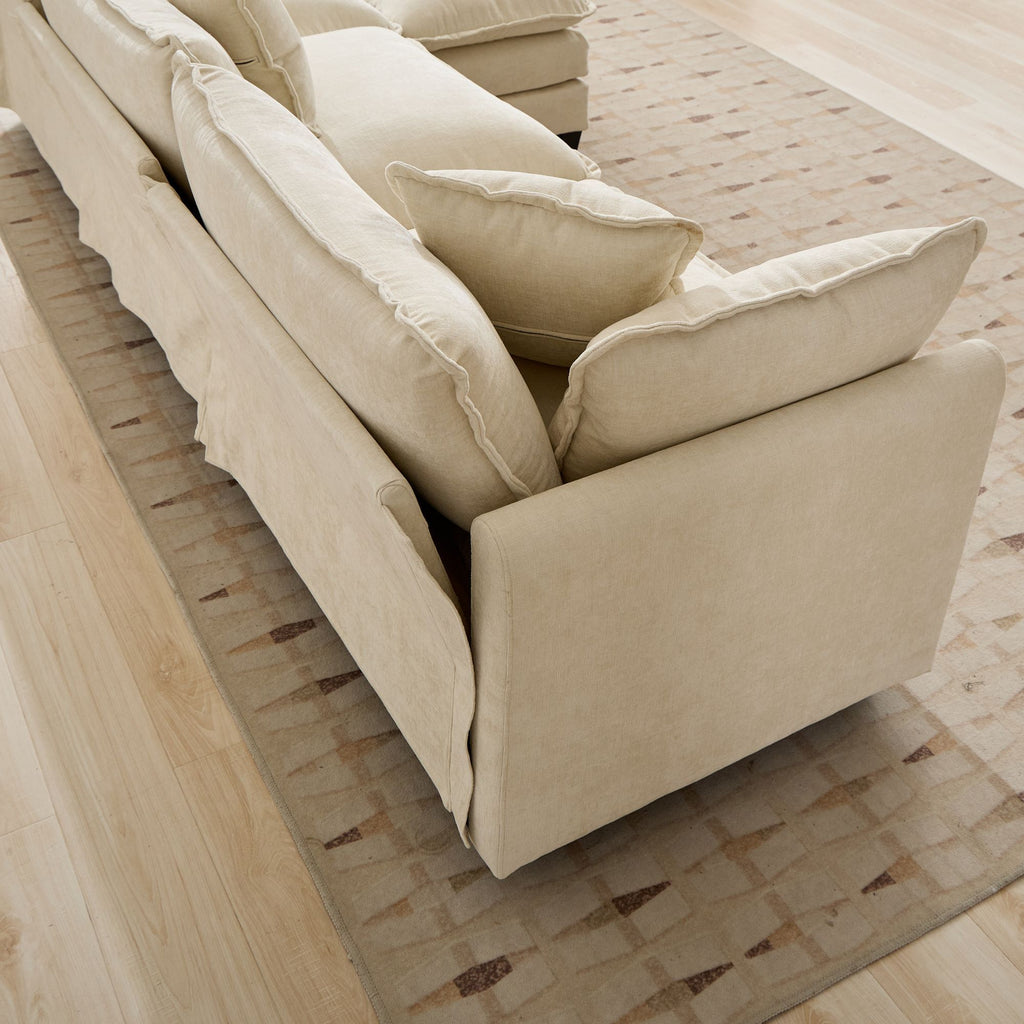 Beige chenille sectional sofa by Anthony & Home in a modern living room setting, showcasing plush cushions and spacious design.