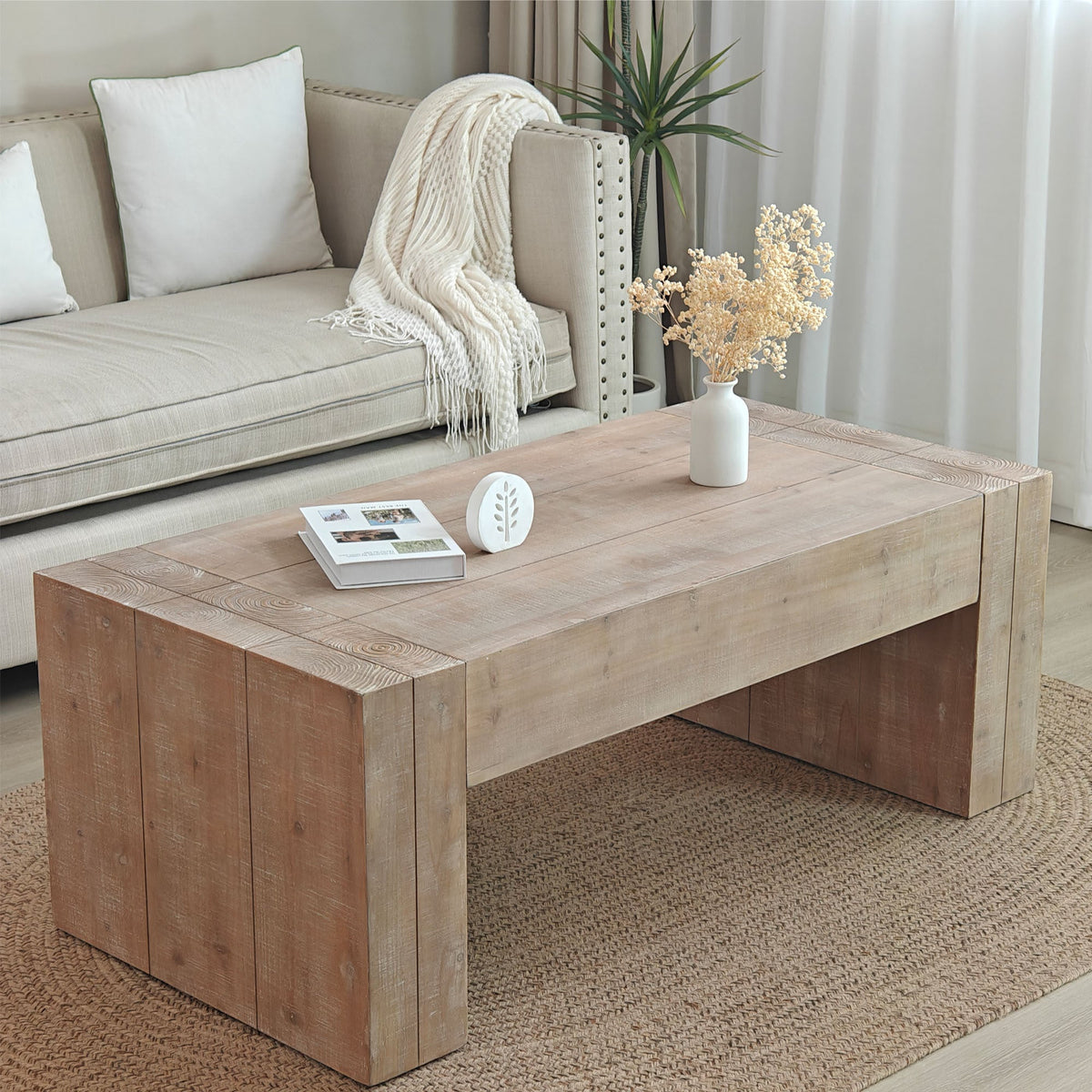 Distressed natural finish engineered wood coffee table by Anthony & Home with sturdy, rustic design and modern style.