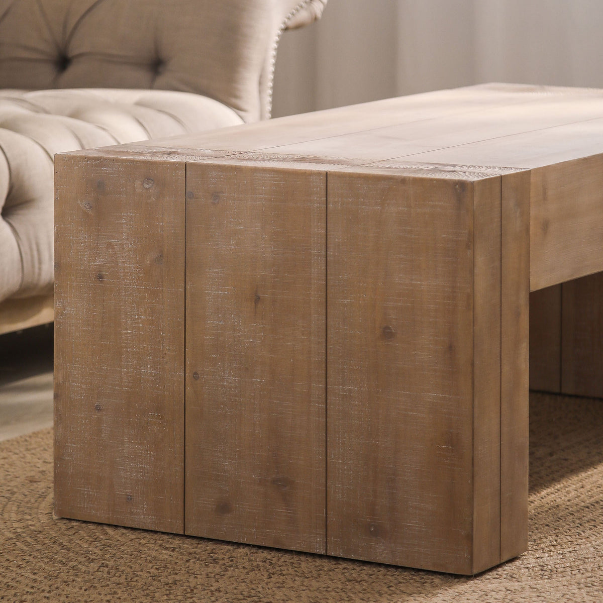 Distressed natural finish wooden coffee table with engineered wood surface, modern design from Anthony & Home.