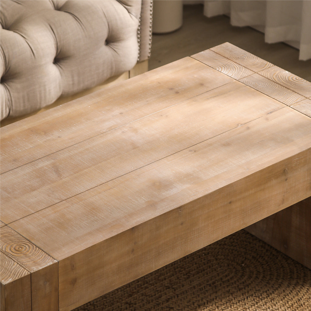 Distressed natural finish engineered wood coffee table by Anthony & Home with sleek modern design and sturdy construction.
