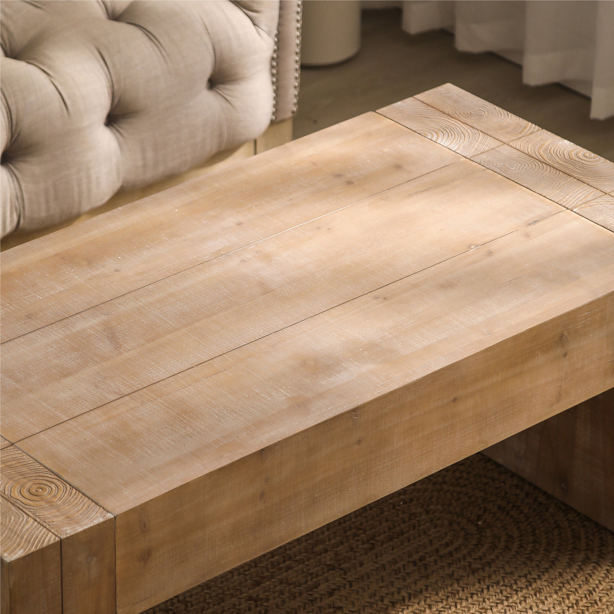 Distressed natural finish engineered wood coffee table by Anthony & Home with sleek modern design and sturdy construction.